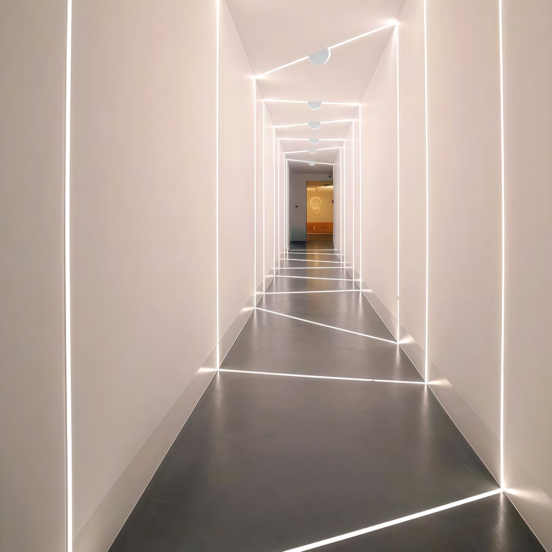 Sophisticated white outdoor wall lights featuring glass shade chandelier influence in minimalist dome configuration for uniform illumination.