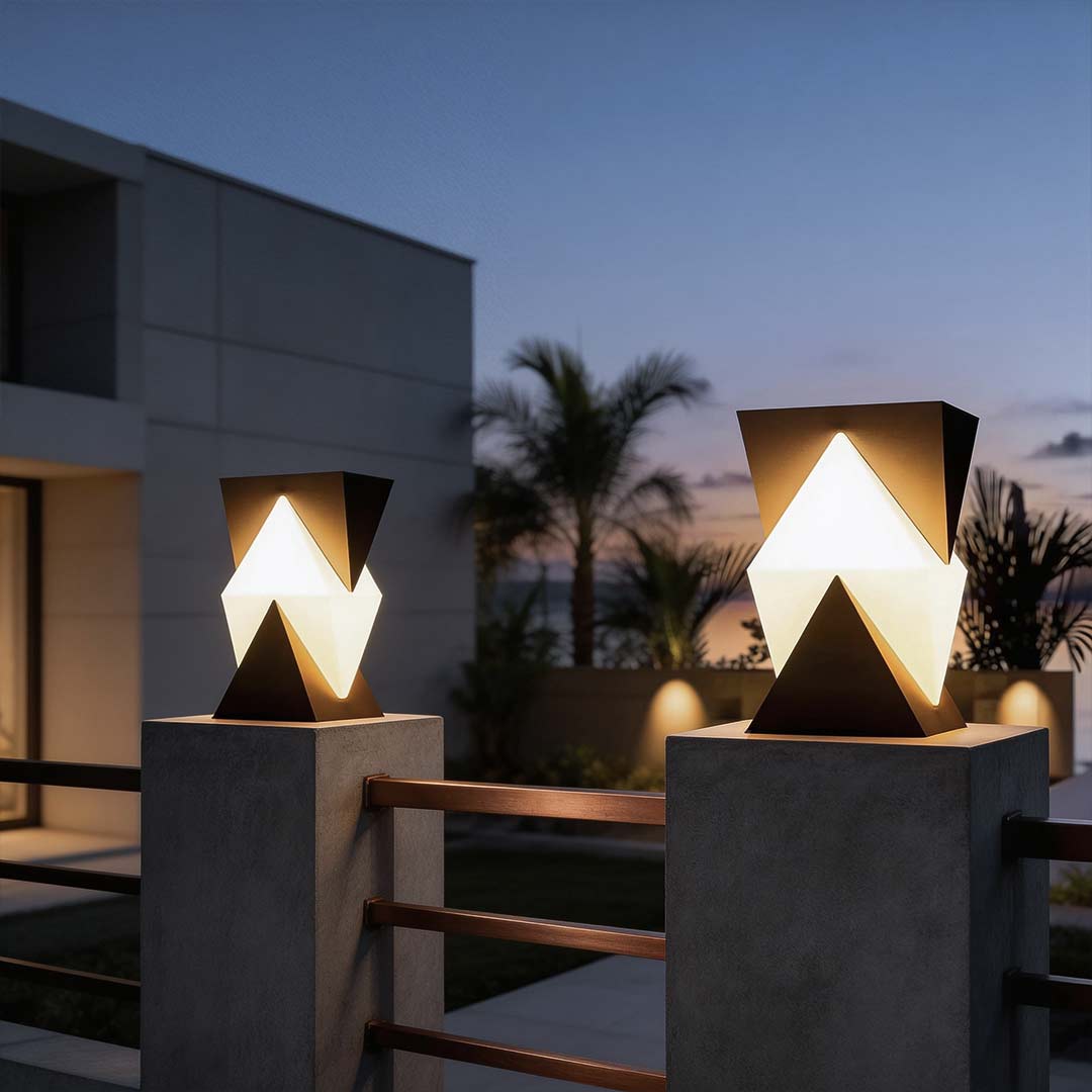 Special shaped pillar light with a geometric design, illuminating a modern outdoor patio.