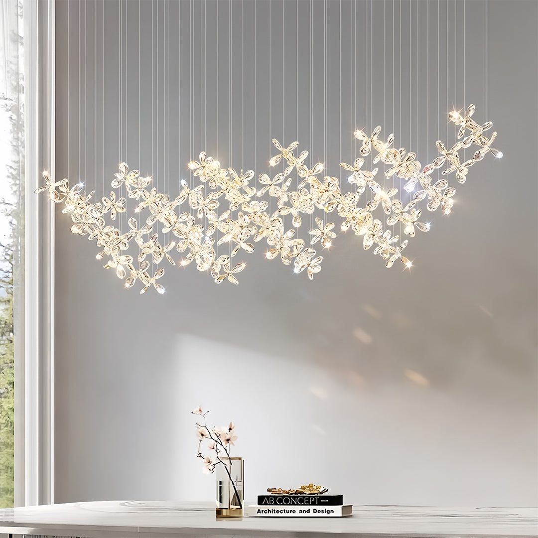 Spectacular rock crystal chandelier installation creating dramatic lighting in modern minimalist interior