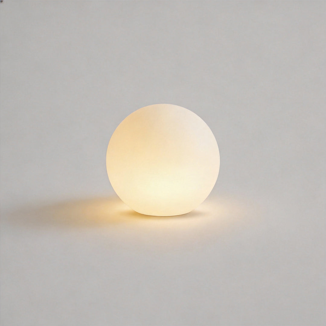 Sphere floor lamp with soft purple LED glow for decorative ambient lighting.