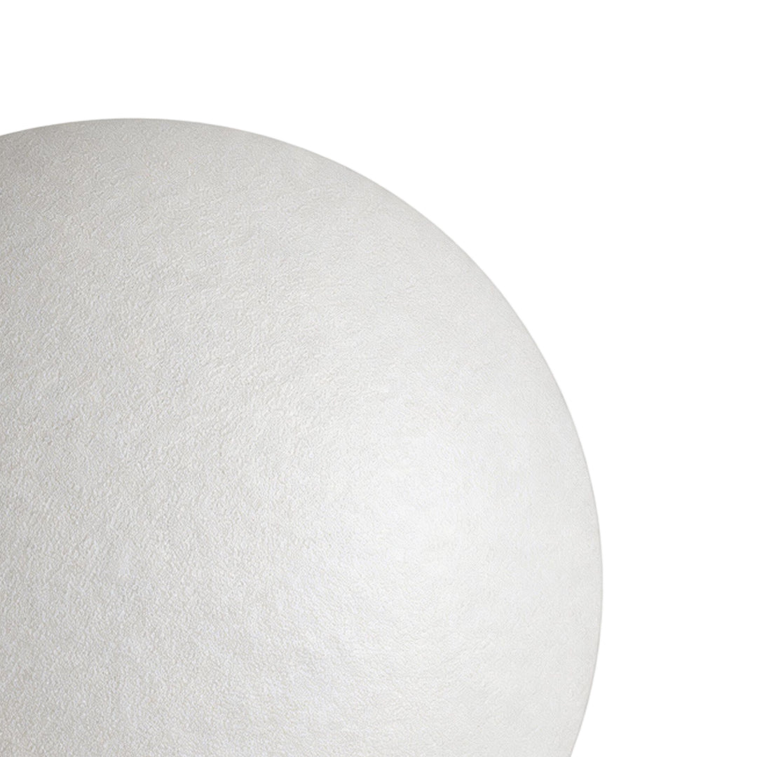 Sphere floor lamp textured surface detail for modern outdoor decorative lighting.