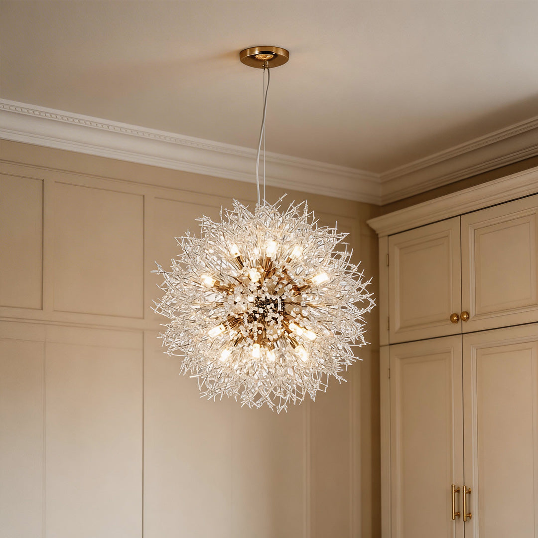 Stunning spherical crystal dandelion chandelier radiating warm light with intricate glass branches in an elegant neutral room.