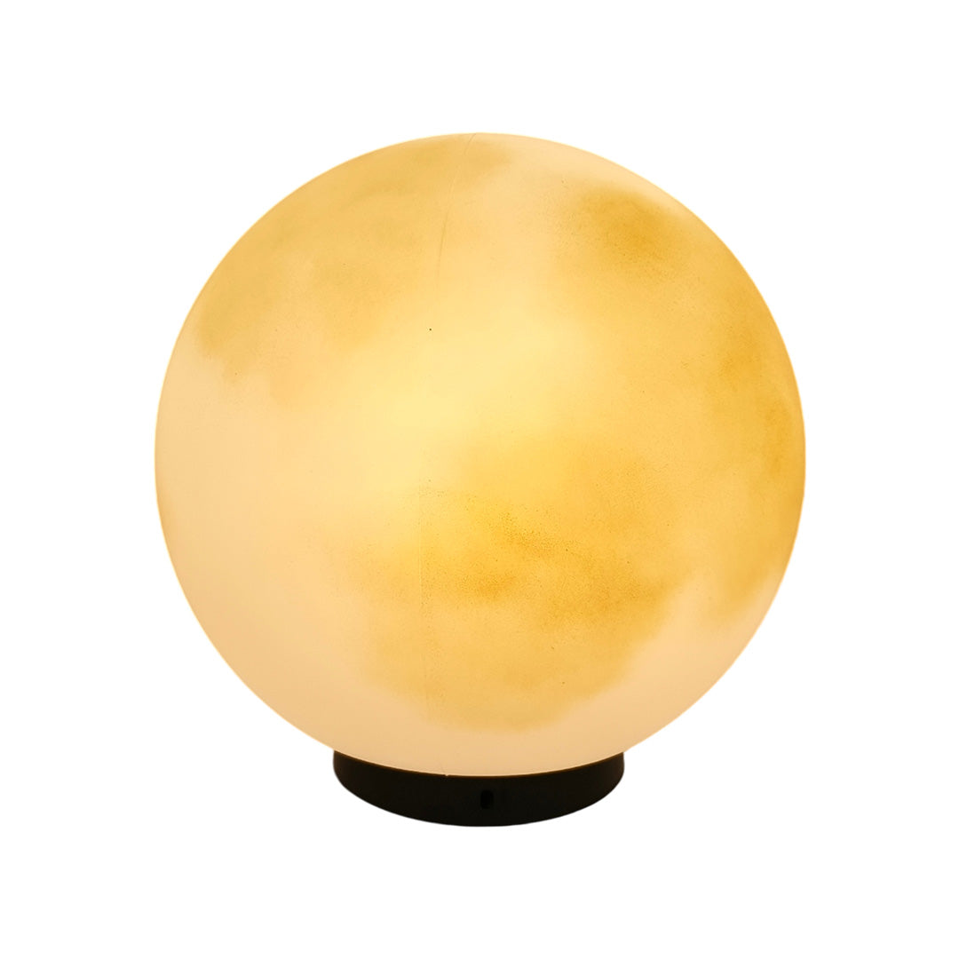 Spherical moon pillar lights illuminating with a soft warm glow isolated on white background.