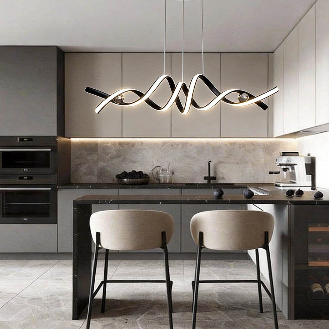 Spiral ceiling light hanging above a modern kitchen island.