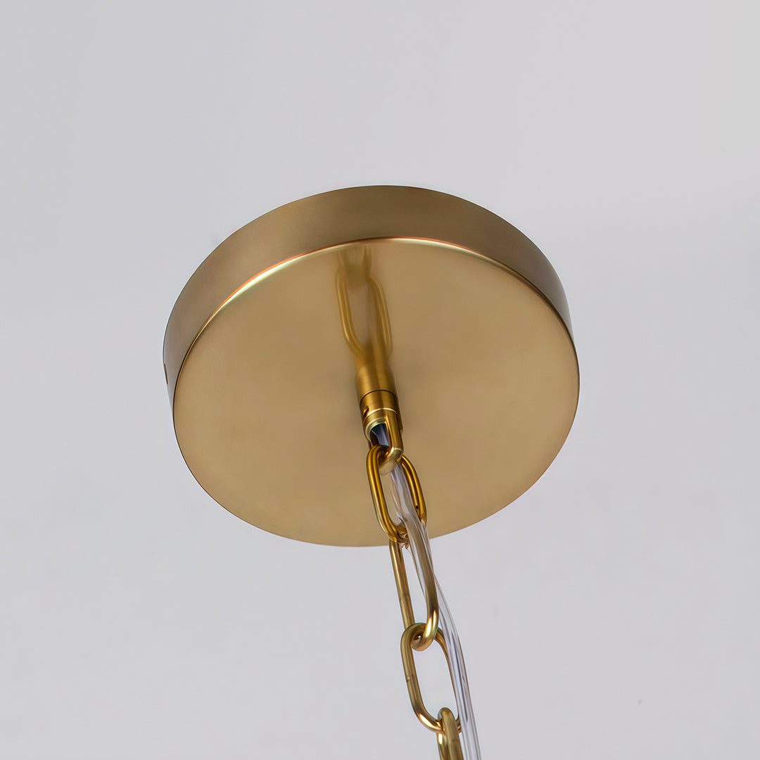 Sturdy brass canopy and chain suspension supporting the spiral globe chandelier
