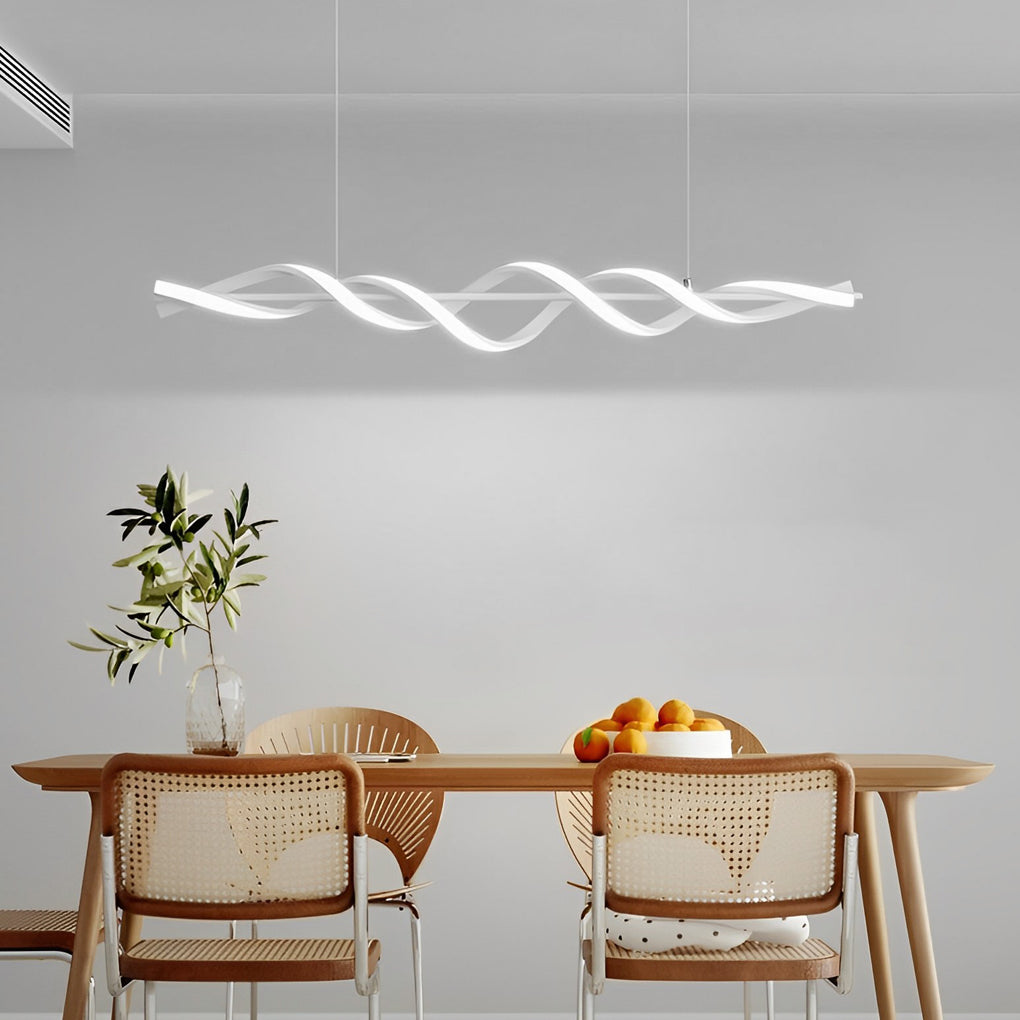 A stylish spiral pendant linear hanging chandelier suspended above a dining table, providing a soft glow to enhance the dining experience.