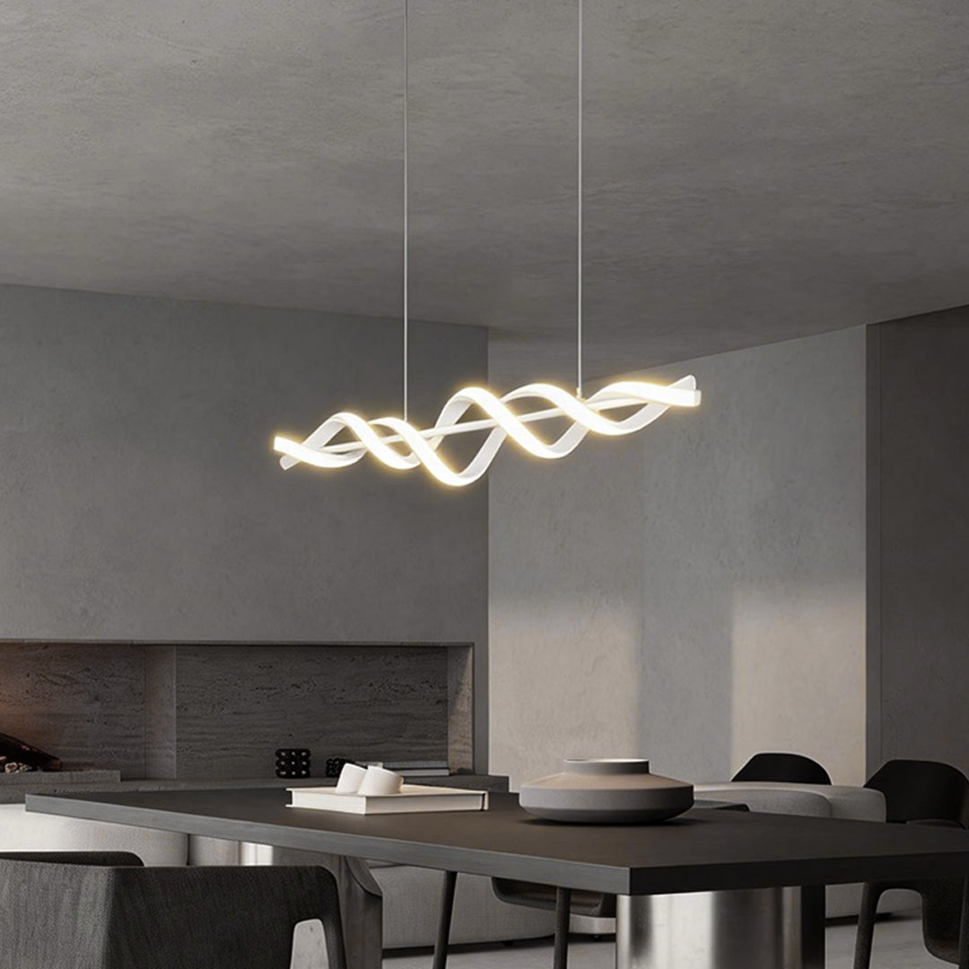 The sleek spiral pendant linear hanging chandelier brings a touch of sophistication to the kitchen, offering both style and function.