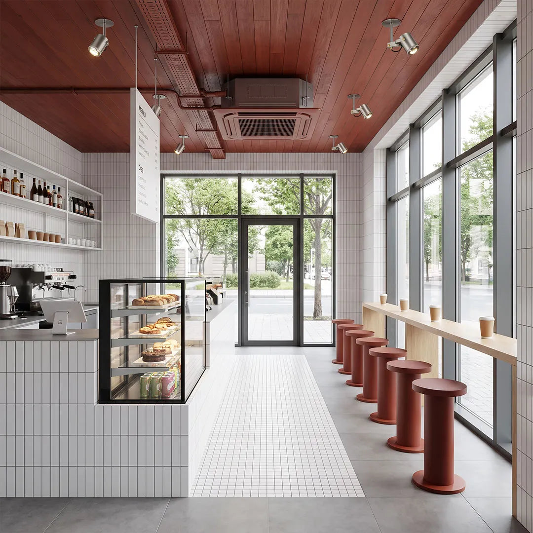 Spotlight ceiling light installed in a modern cafe with multiple adjustable ceiling fixtures.