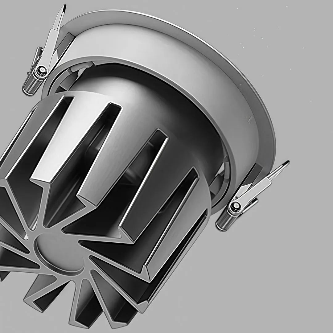 Close-up of spotlight ceiling lights showing the recessed housing, cooling fins, and mounting clips.