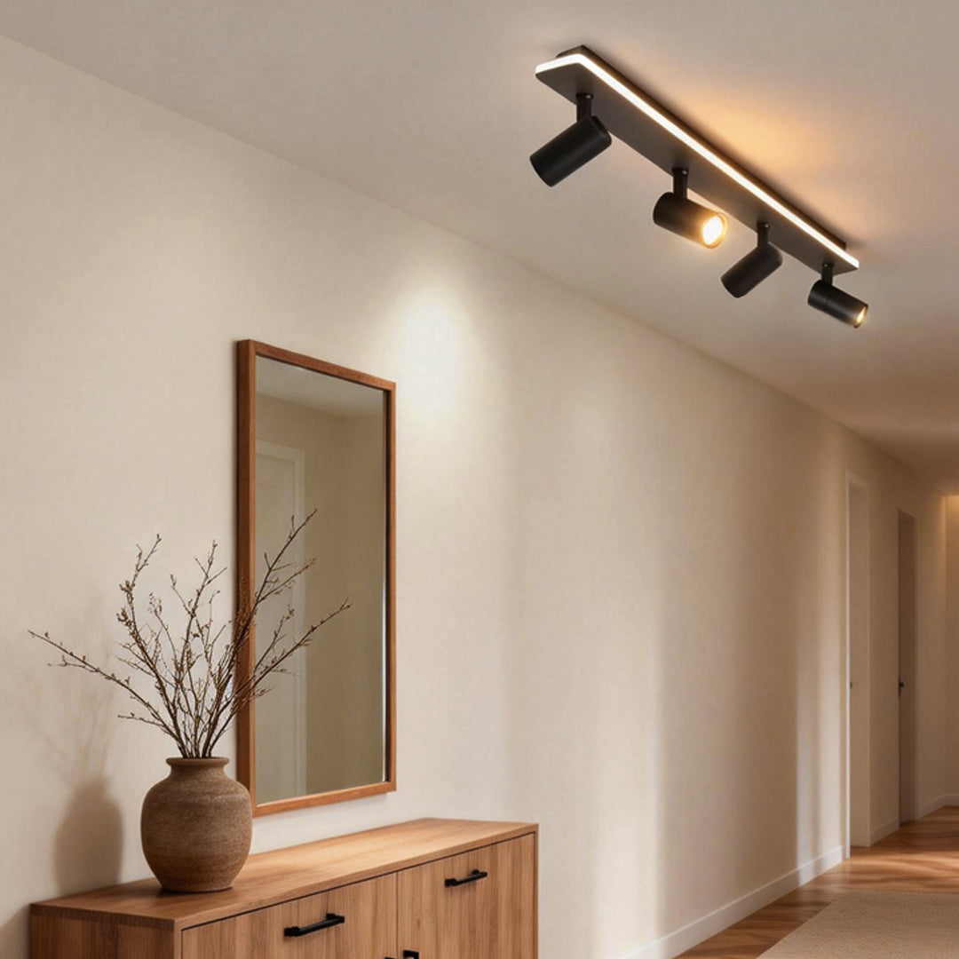 Spotlight Fixture mounted in a hallway ceiling, offering adjustable directional lighting for a clean and minimalist interior.