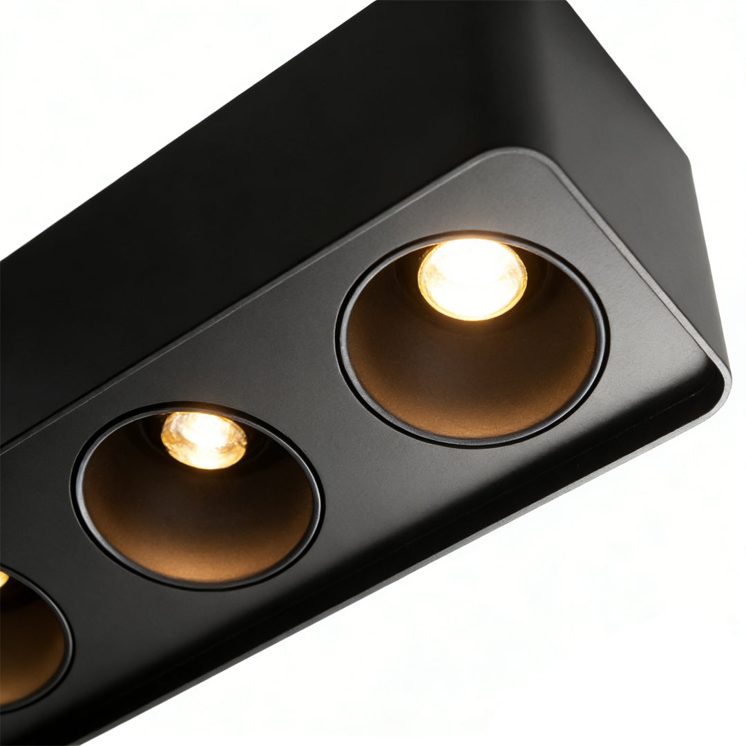 Spotlight LED square with a close-up of its black light heads and ceiling mount.