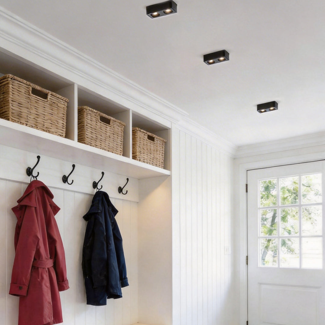 Spotlight LED square with a single light head, illuminating a cozy hallway.