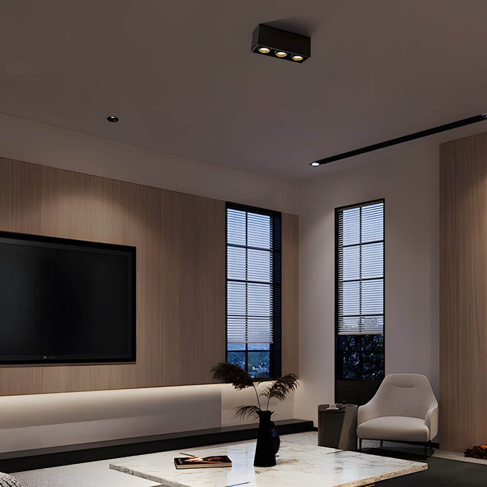 Spotlight LED square with a sleek design, providing ambient light in a dining room.