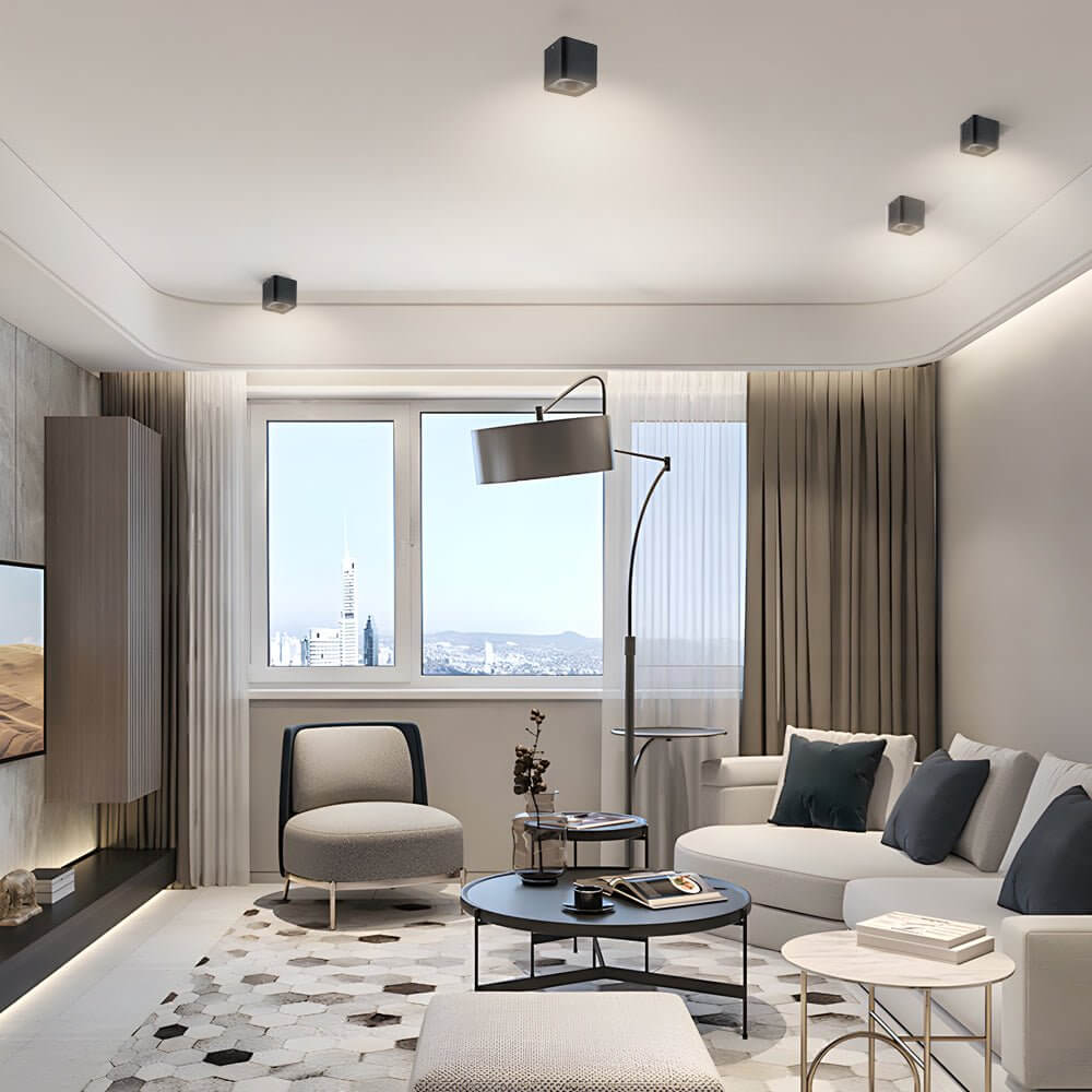 Spotlight LED square with a sleek black design, providing focused light in a bedroom.