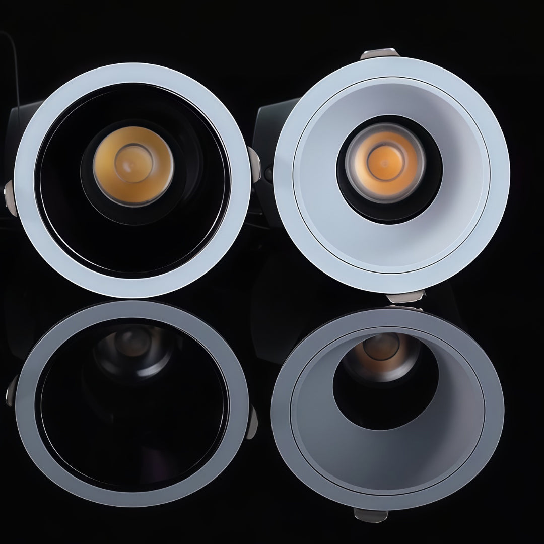 Spotlights for house collection showing four different trim options with white, black, and reflector finishes