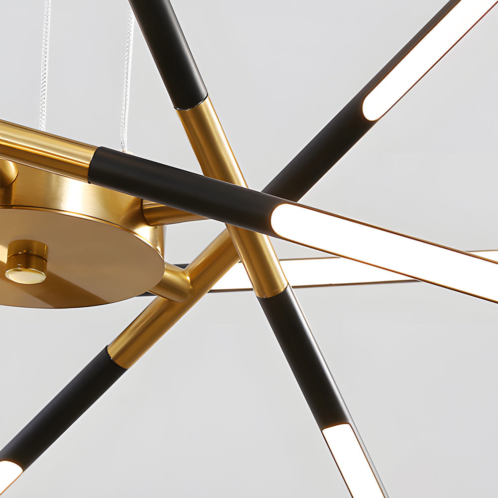 Close-up detail of a Sputnik chandelier showing black and gold metal rods, illuminated linear arms, and the round ceiling canopy.