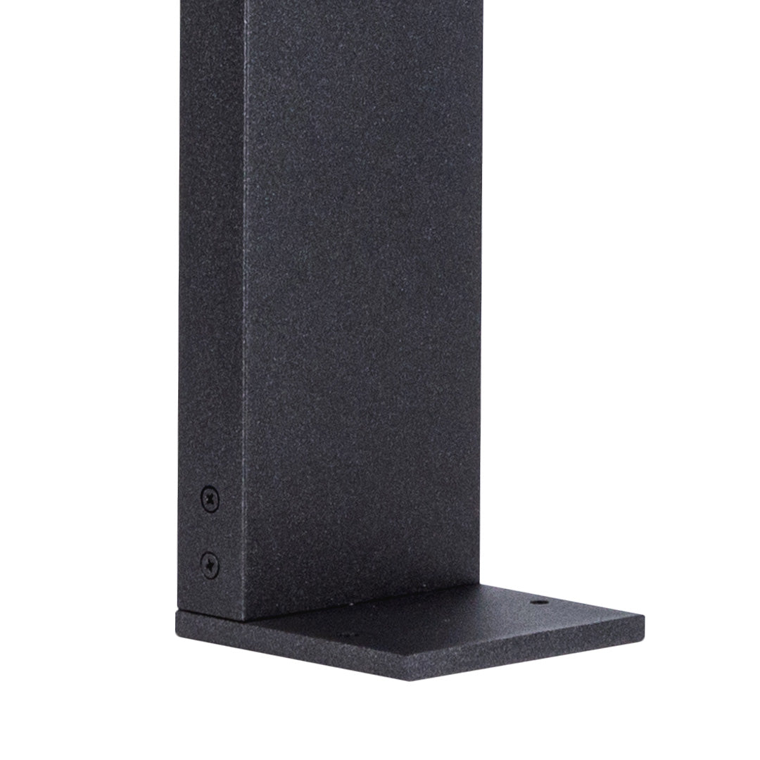 Close-up view of square base outdoor bollard light in matte black finish