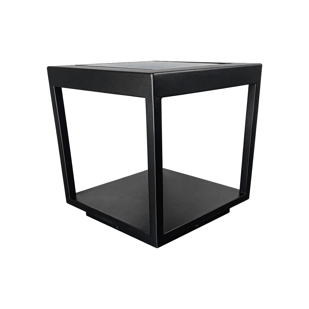 High angle view of square black concrete pillar light for outdoor garden fences and patios ok.