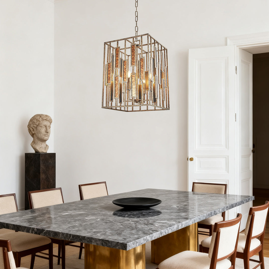 Square caged vintage copper pendant light with inner crystal rods, providing ambient light over a sleek, gray marble dining table.