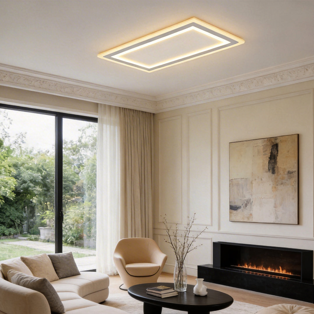 Square flush mount light with a sleek design, enhancing a contemporary living room.