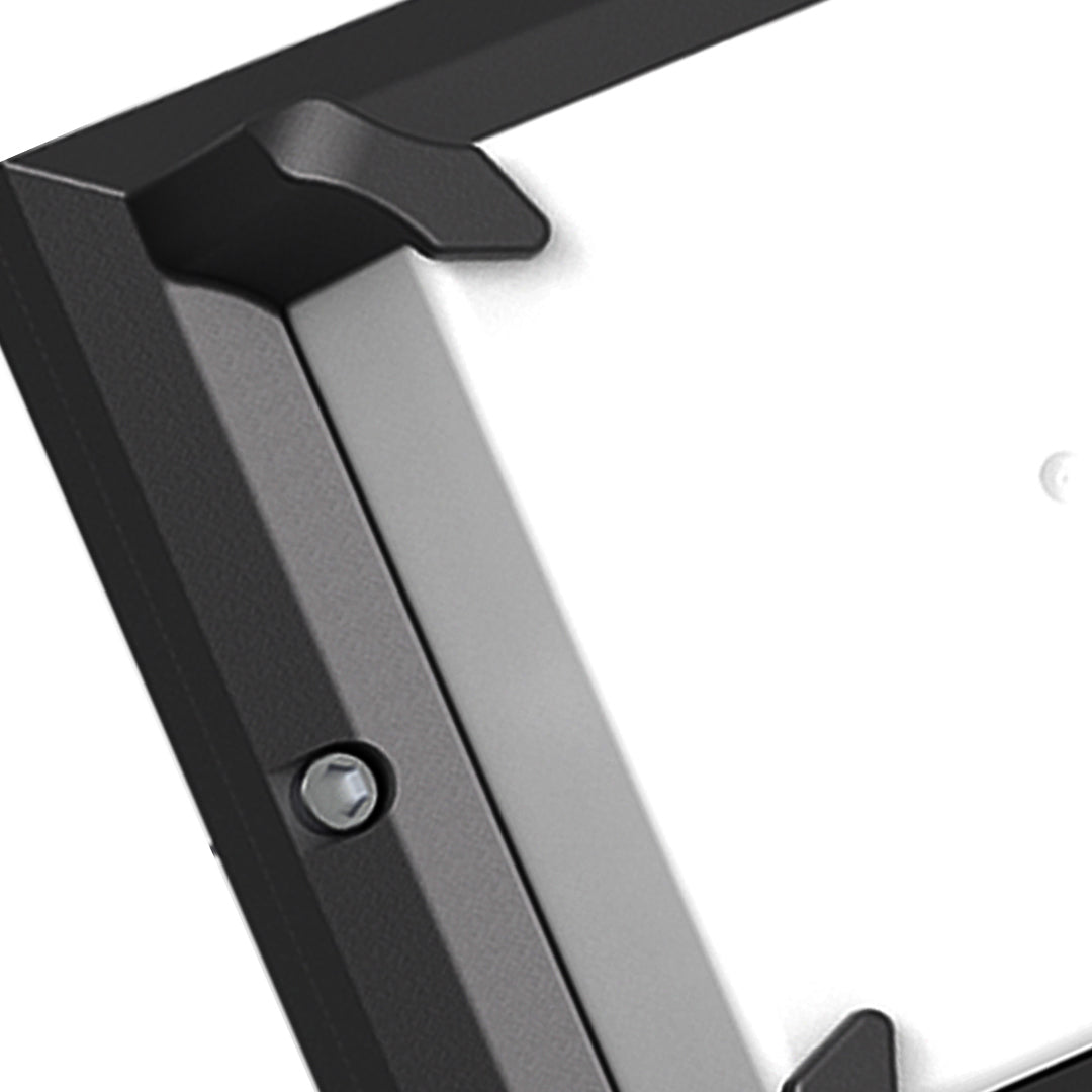 Close-up showing the corner of the square-frame Black Outdoor Wall Light with a smooth white diffuser and mounting screw detail.