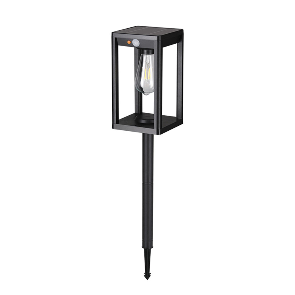 Square frame pathway light featuring dark metal construction with transparent glass enclosure