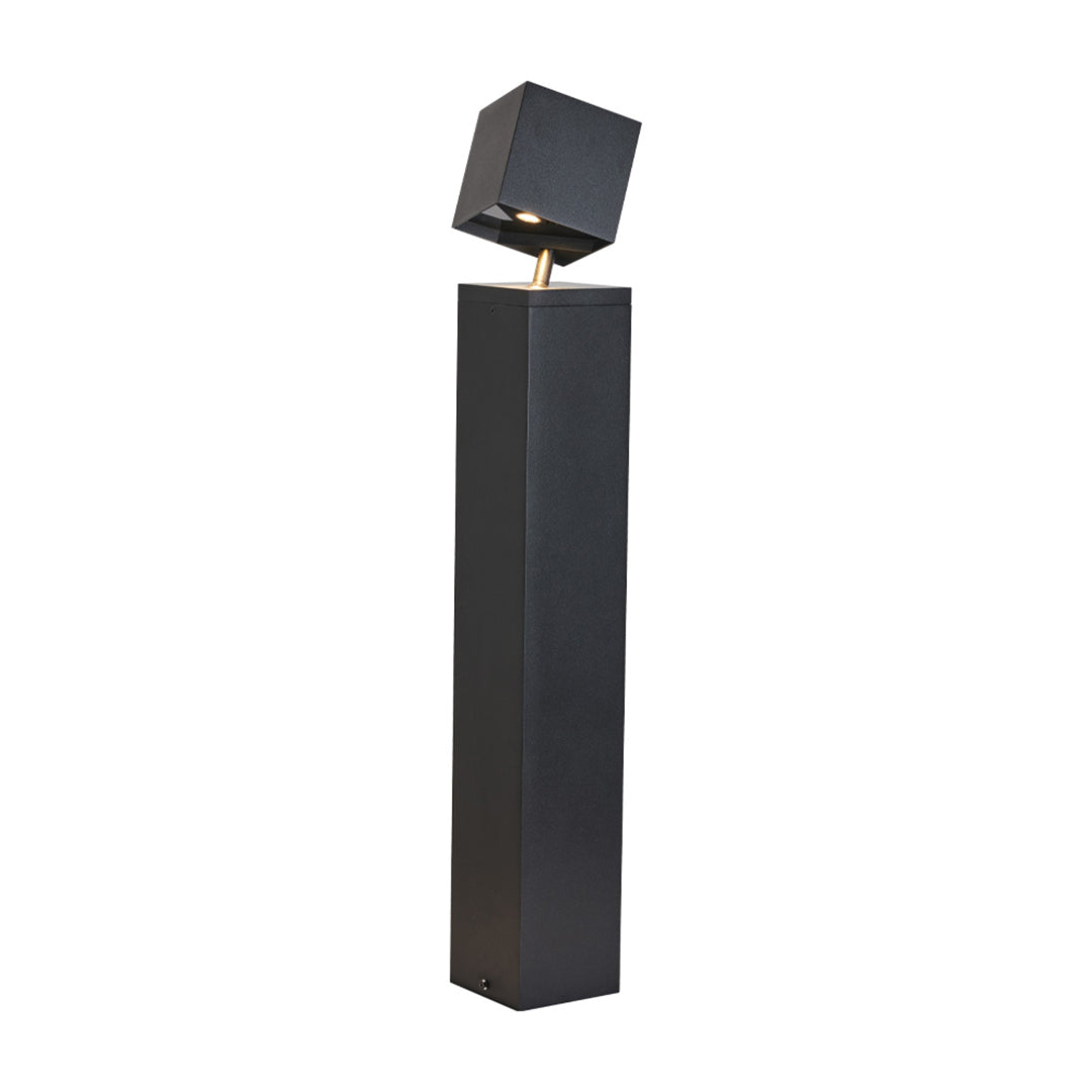 Modern black square-head pathway outdoor light with sleek cylindrical post for contemporary landscape design
