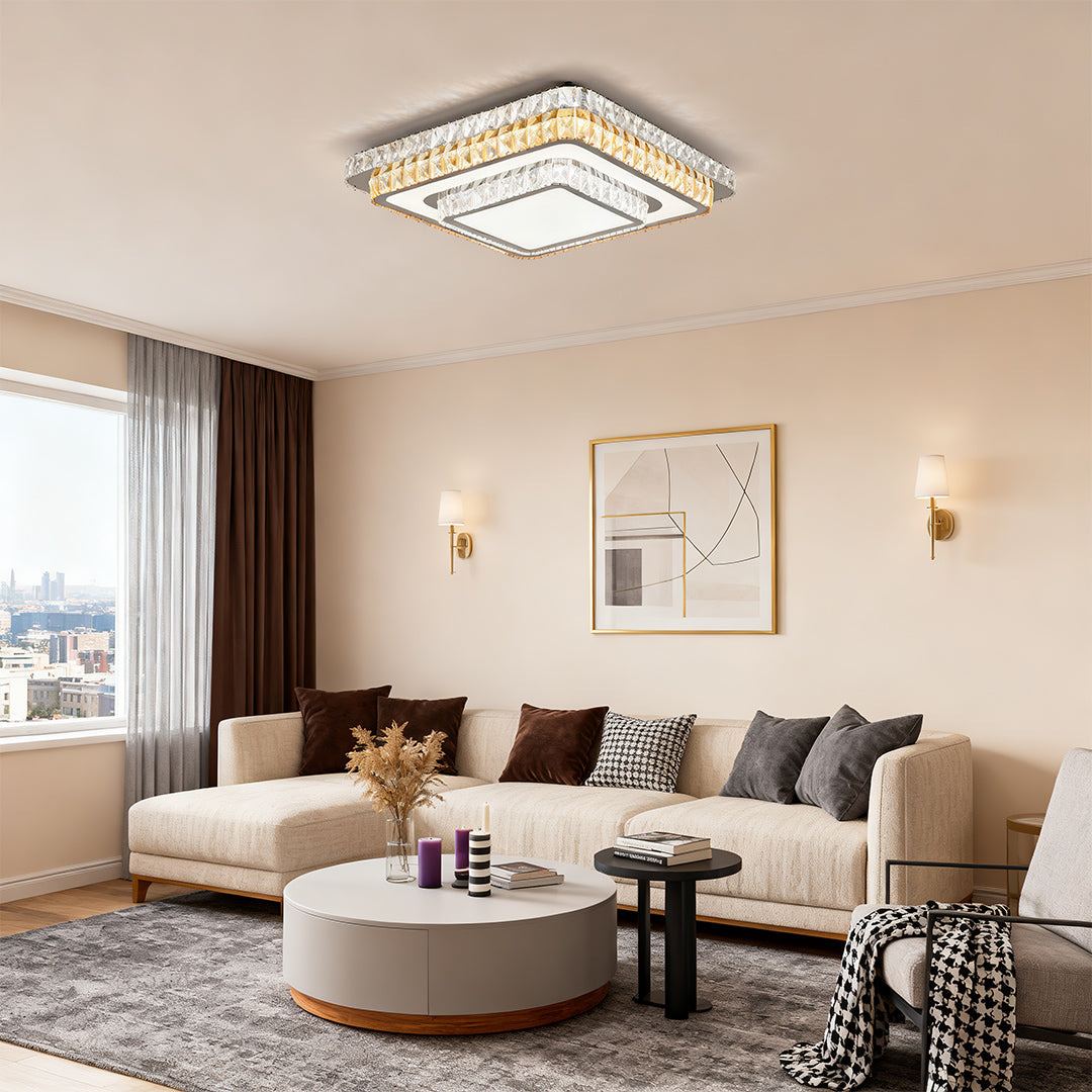 Square modern flush mount light fixture creating a soft glow in a stylish living room.