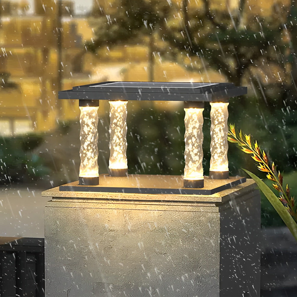 Square pillar lamp with a sleek design, illuminating a contemporary outdoor space.