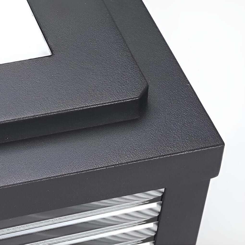 Square pillar light ribbed glass outdoor metal light combines durability and aesthetic appeal for all outdoor lighting needs.