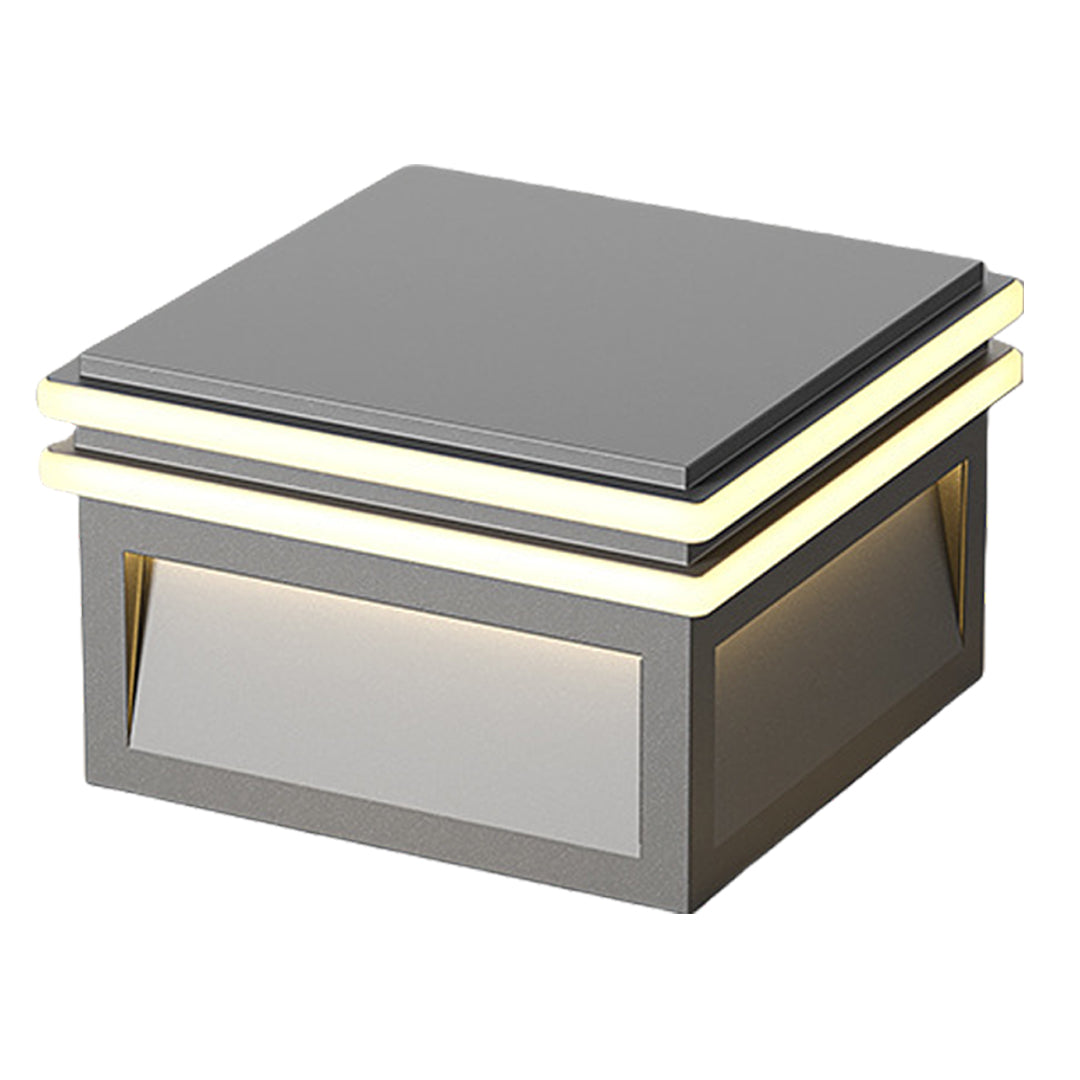 Minimalist square pillar light with geometric metal frame and integrated LED panel for modern outdoor spaces