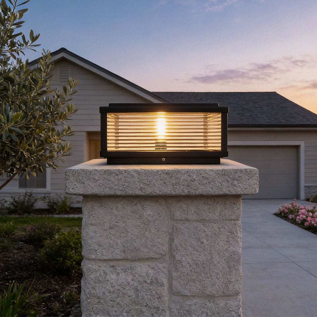 Square pillar light ribbed glass outdoor metal light provides durable, stylish illumination for gardens, pathways, and patios.