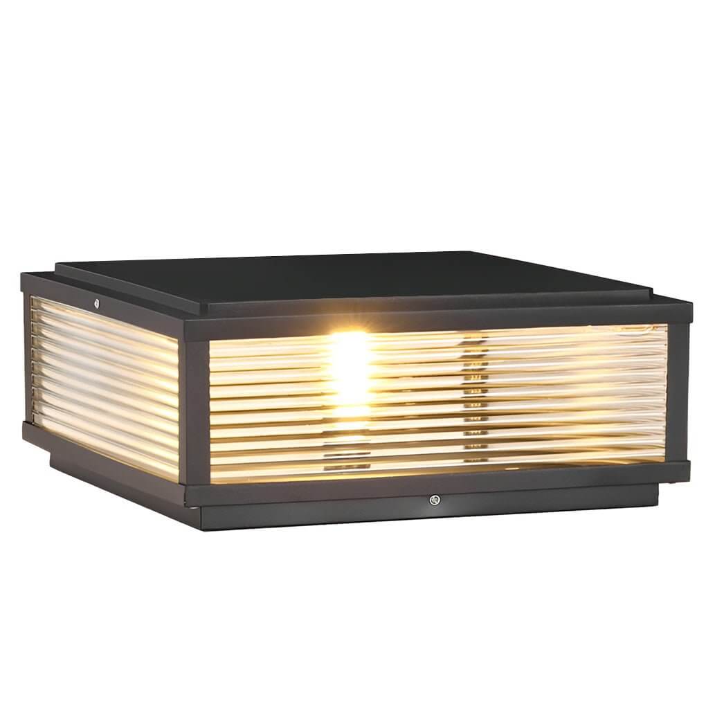 Square pillar light ribbed glass outdoor metal light enhances outdoor spaces with soft, diffused lighting and contemporary design.