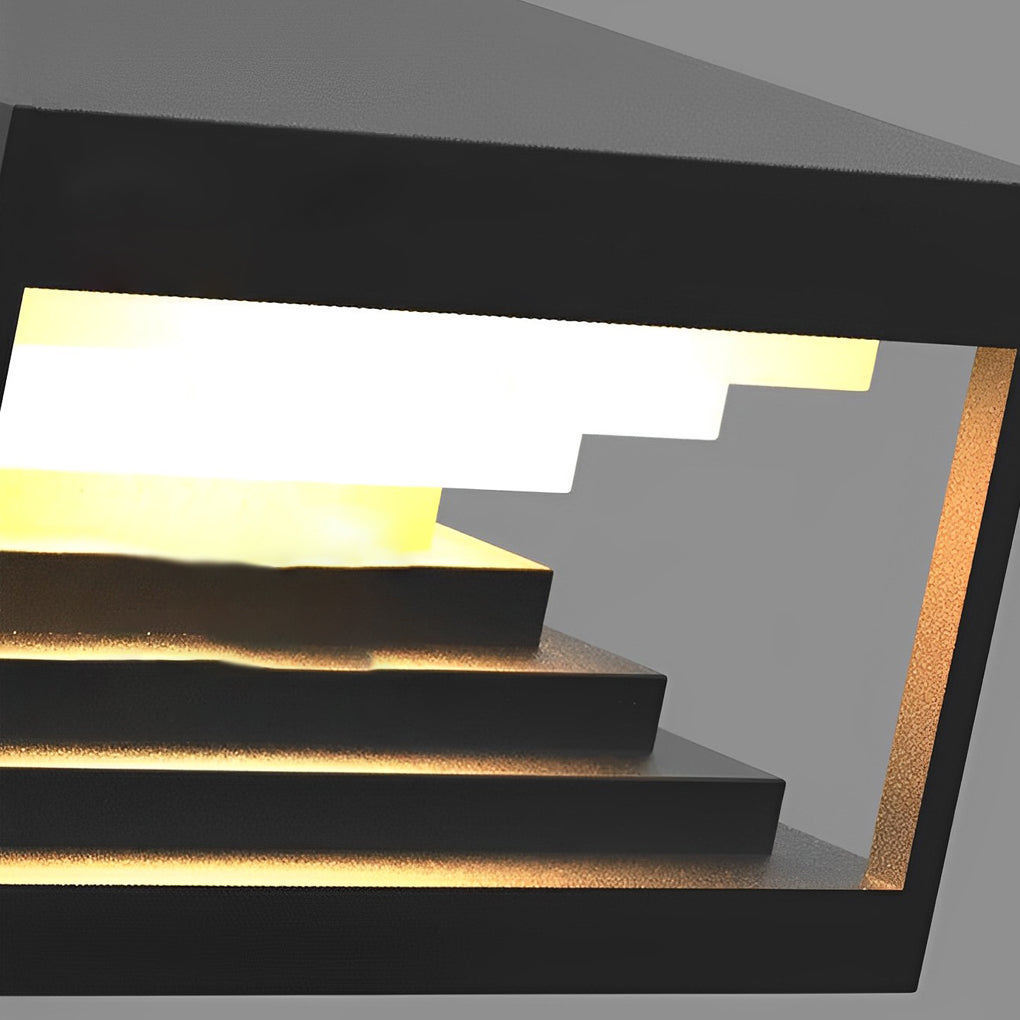 Square pillar lights with close-up of their geometric design and light output.