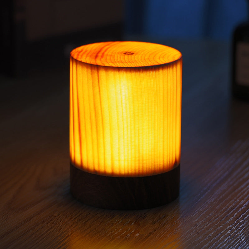 Square wood lamp with a close-up of the illuminated wooden texture.