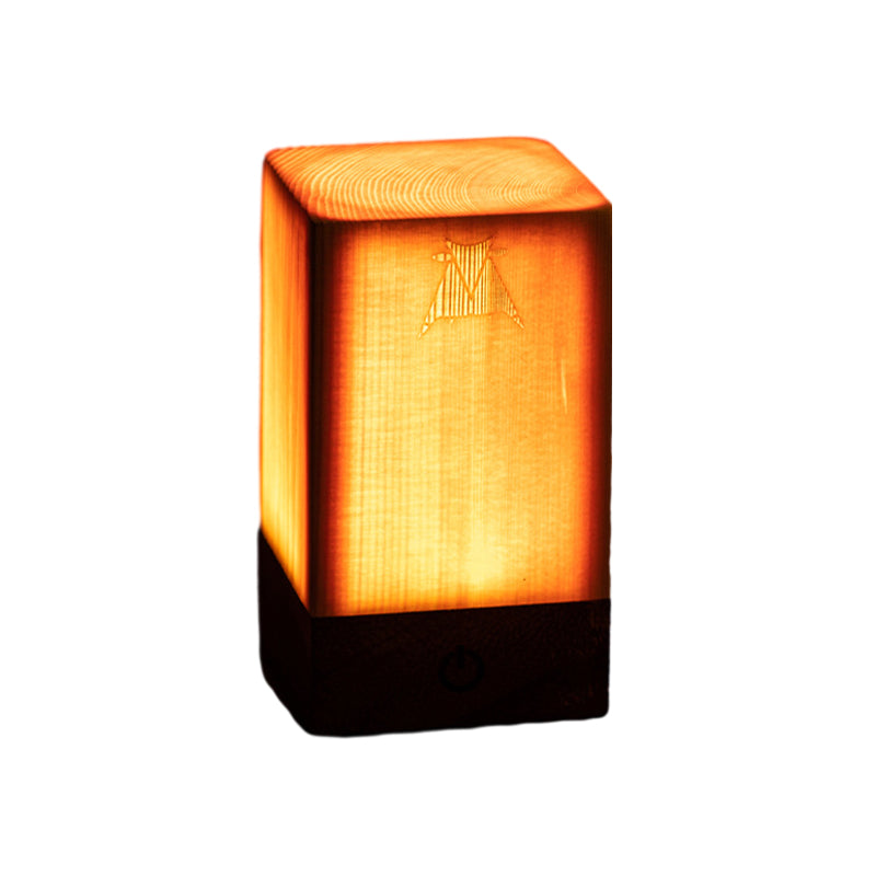 Square wood lamp in cylindrical shape, side view of the minimalist design.