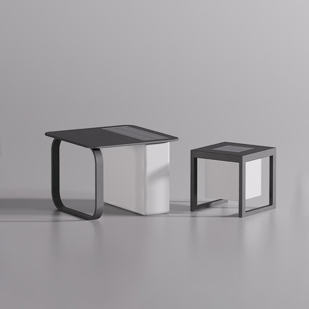 Stacked modern outdoor lighting cubes with sleek frames, compact handheld light style for contemporary spaces
