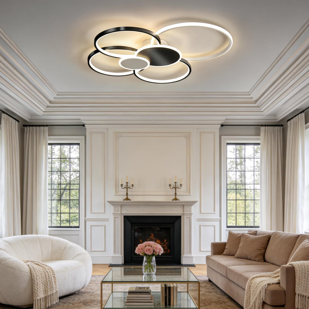 Stacked ring ceiling light installed in an elegant living room with classic interior design.
