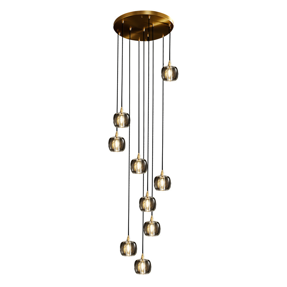 Close-up of staircase crystal chandelier showcasing its golden crystal details.