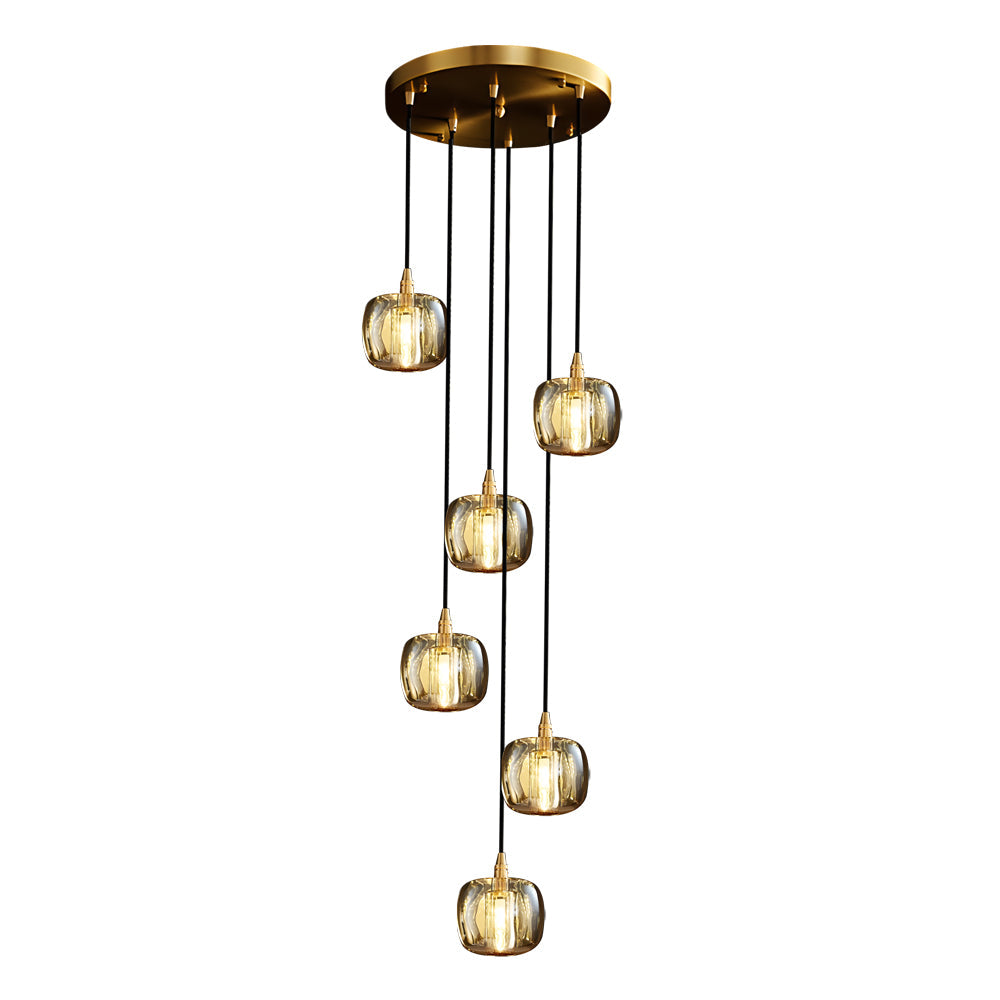 Staircase crystal chandelier with golden accents, providing soft illumination in a hallway.