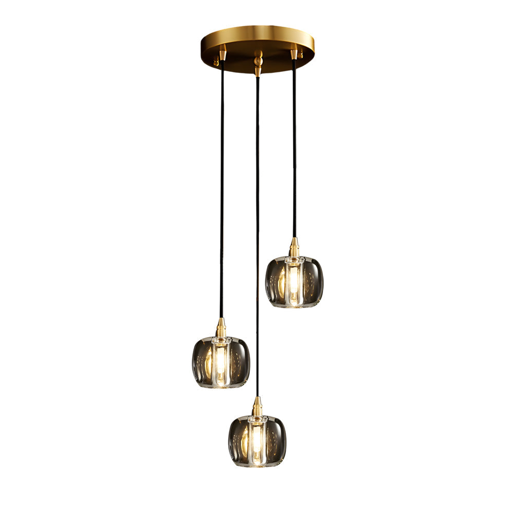Staircase crystal chandelier with a sleek design, hanging above a dining table.