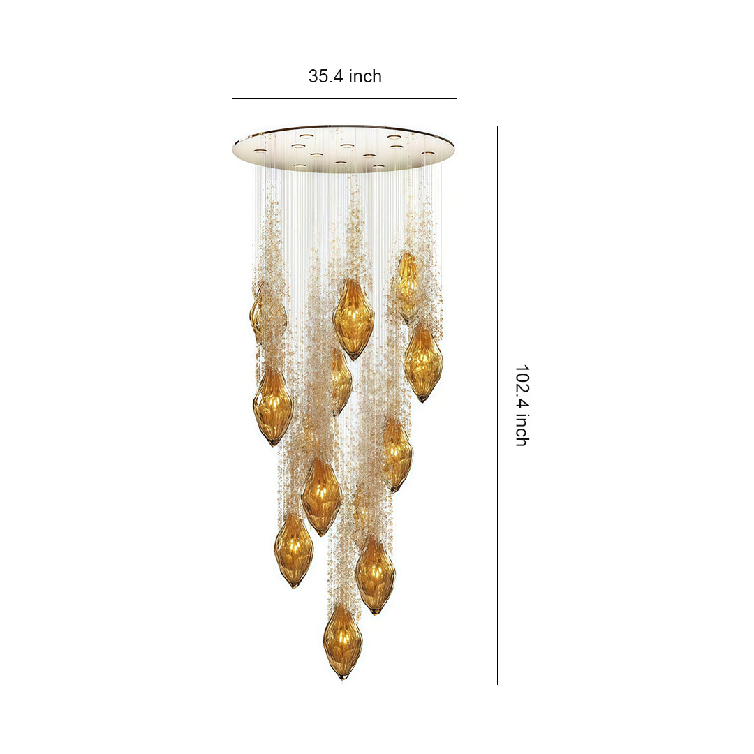 Luxury stairway chandelier featuring gold glass teardrop pendants.
