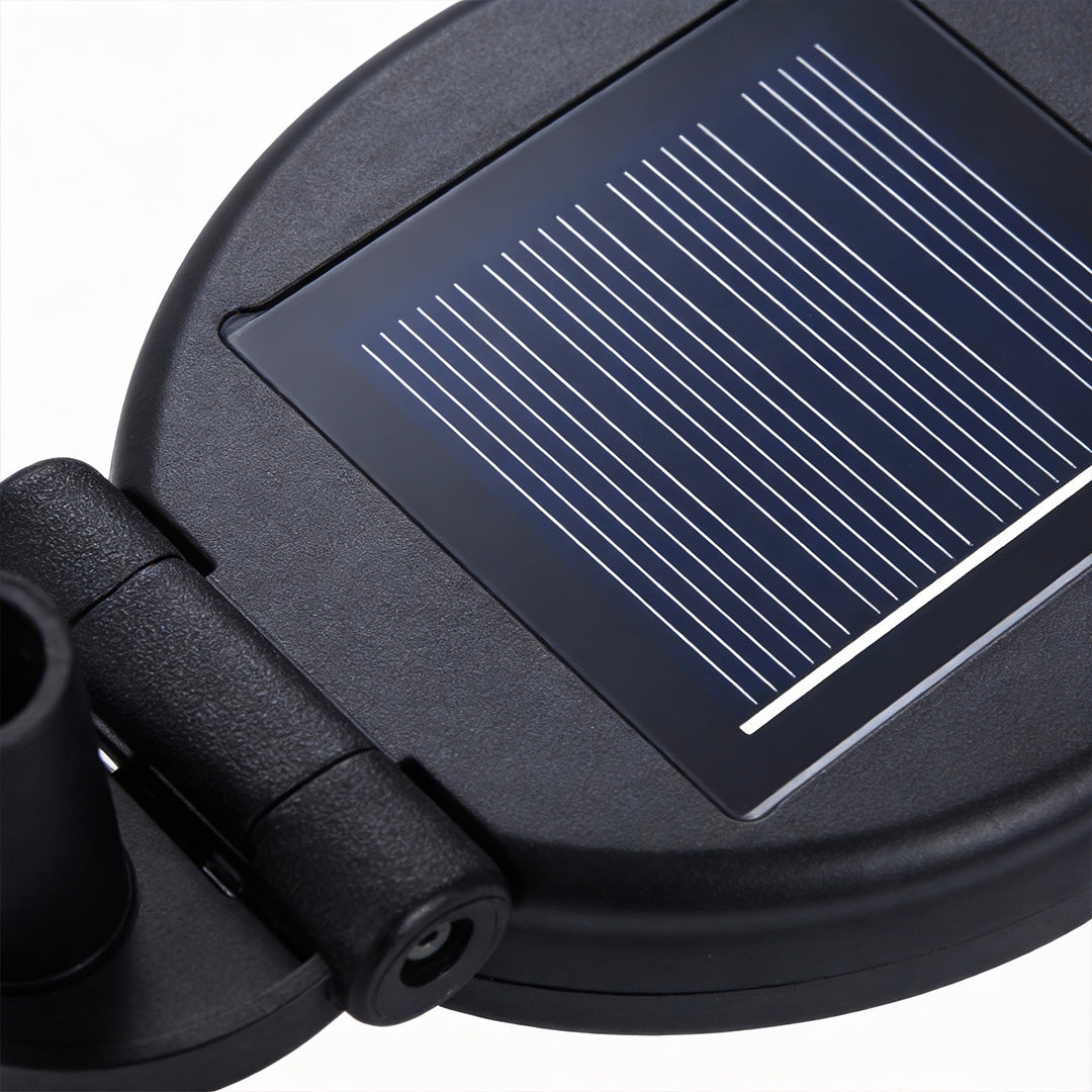 Close up of a starburst garden lights, showcasing the solar panel for eco-friendly operation.