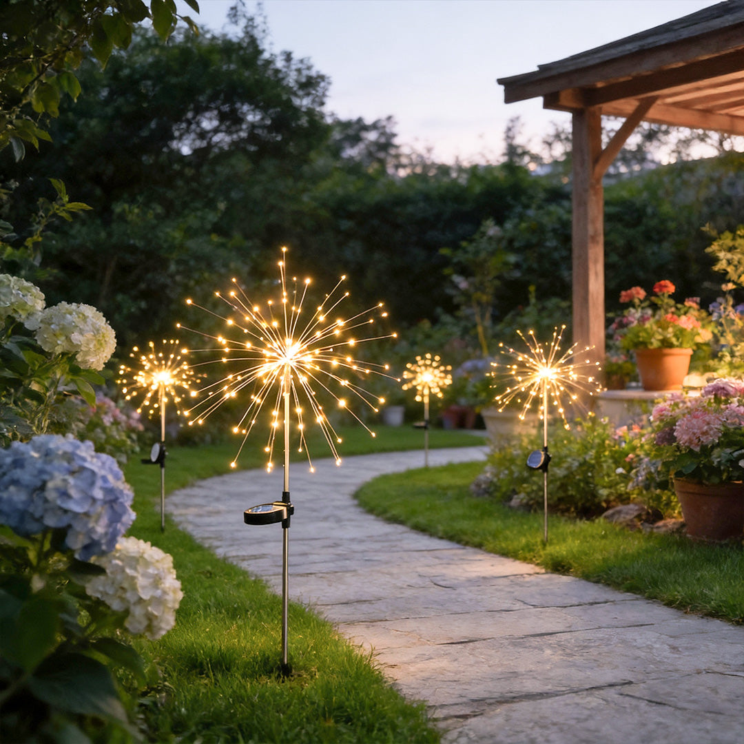 Starburst garden lights illuminating a winding garden pathway, creating a magical and inviting ambiance.