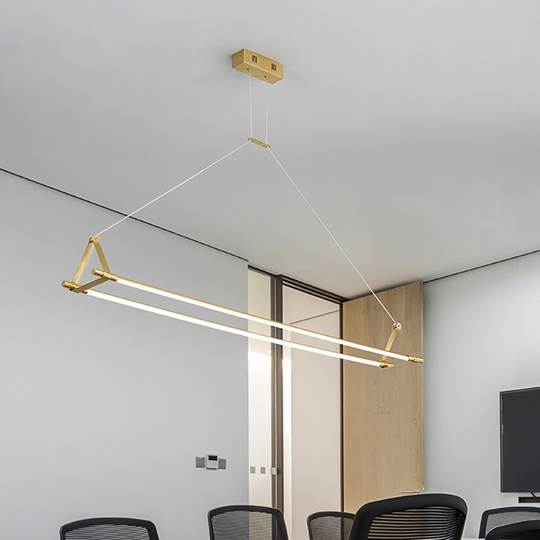 Statement linear pendant lights with black rectangular frame above contemporary dining area