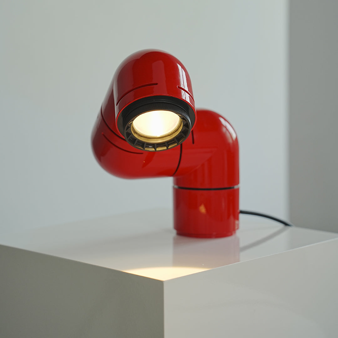 Statement table lamps with creative pipe design and modern rotating structure, adding bold style and flexible lighting to interiors.