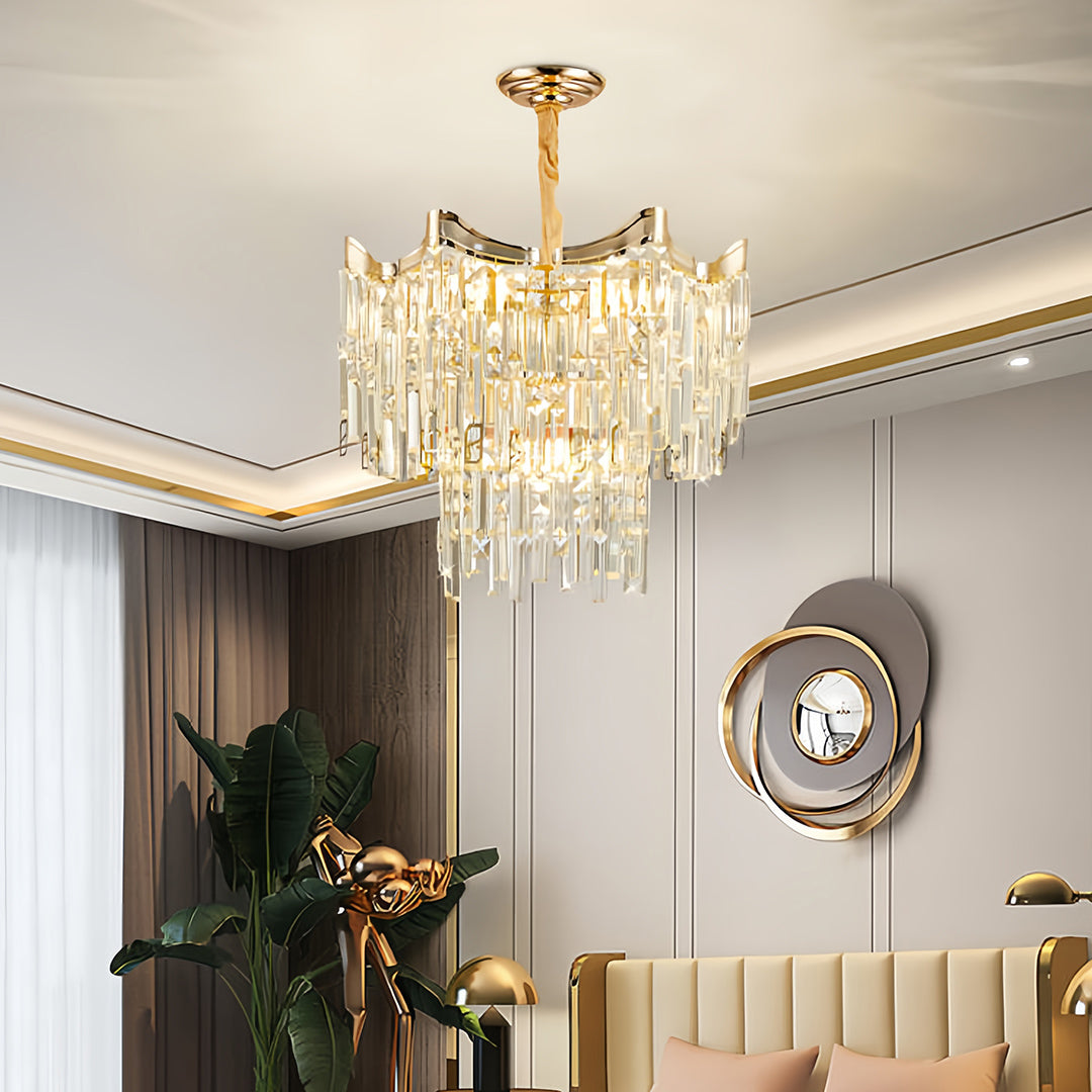 Statement tiered glass chandelier creating dramatic focal point in upscale dining room interior