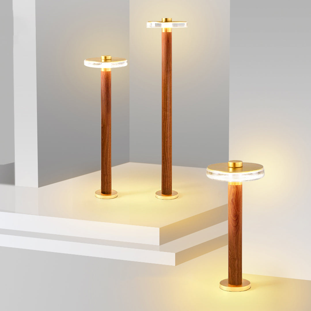 Warm bronze landscape pathway lighting installed along modern concrete steps for outdoor ambiance.