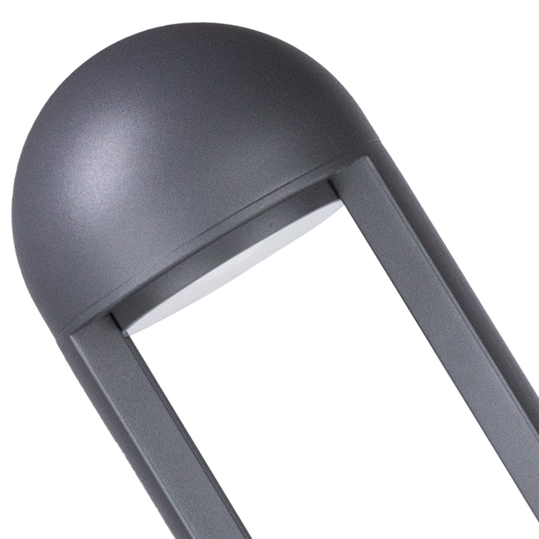 Close-up detail of curved bollard light with integrated LED panel and dark finish