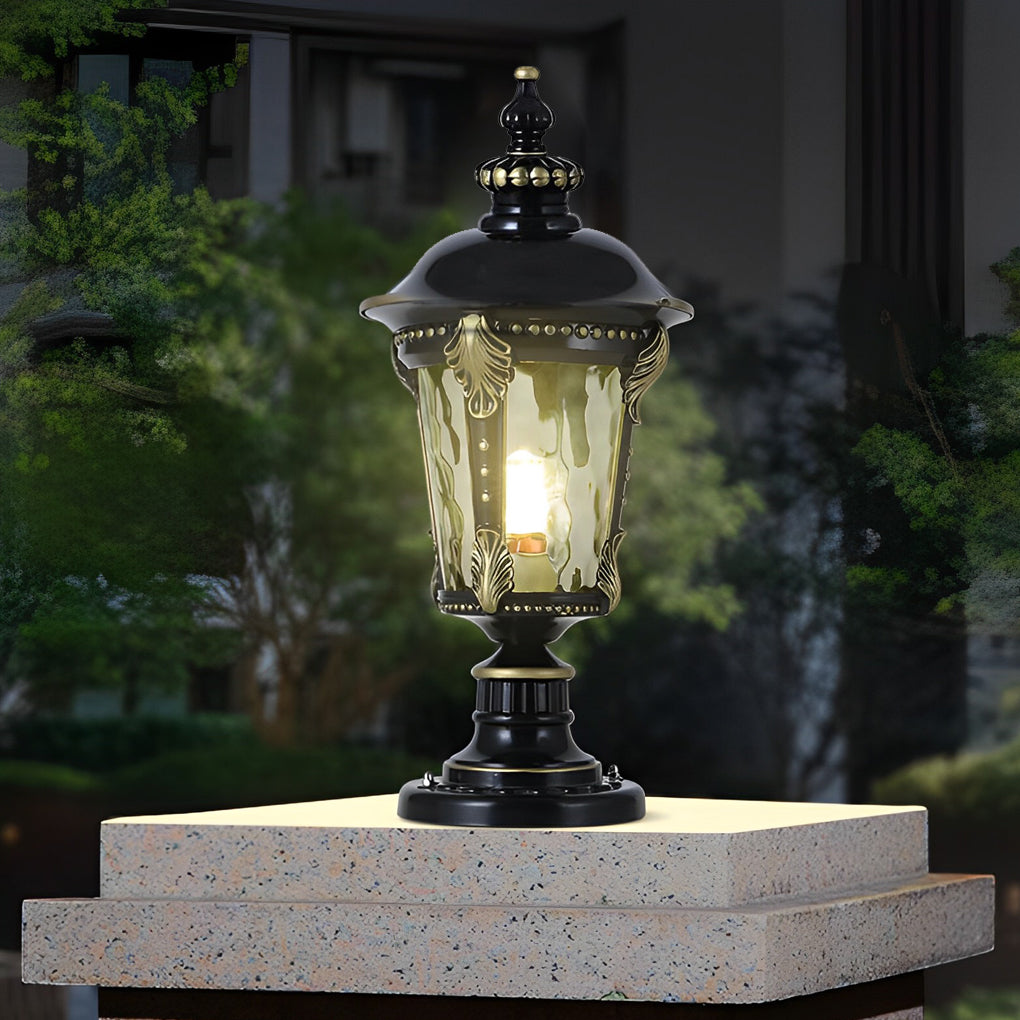 Stone pillar lights near a stone wall, creating a harmonious blend with the natural surroundings.